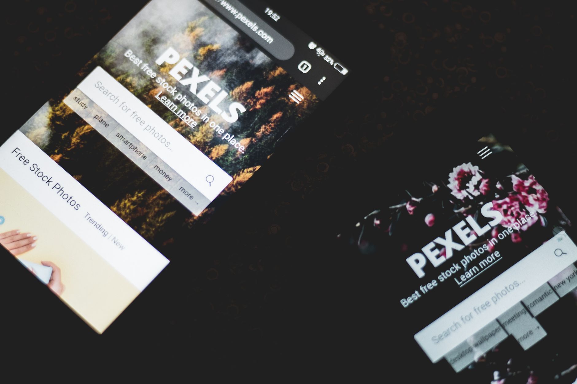 Two smartphones display the Pexels website, illustrating mobile-first web design best practices