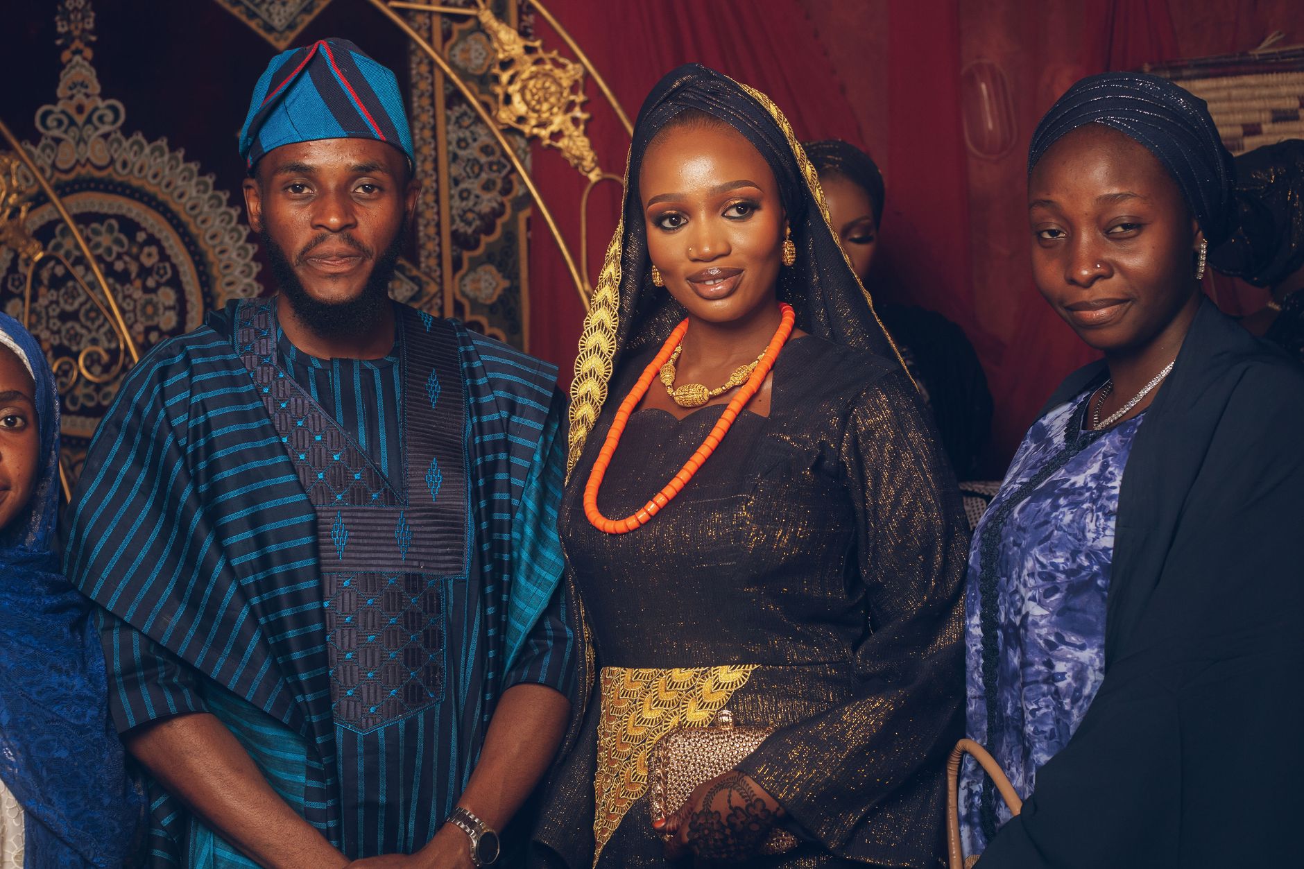 Nigerian groom and bride in traditional attire during wedding celebrations
